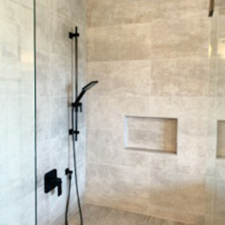 Walk in shower renovation with white wall tiling